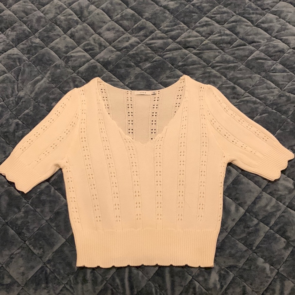 Knitted shirt by Lush.